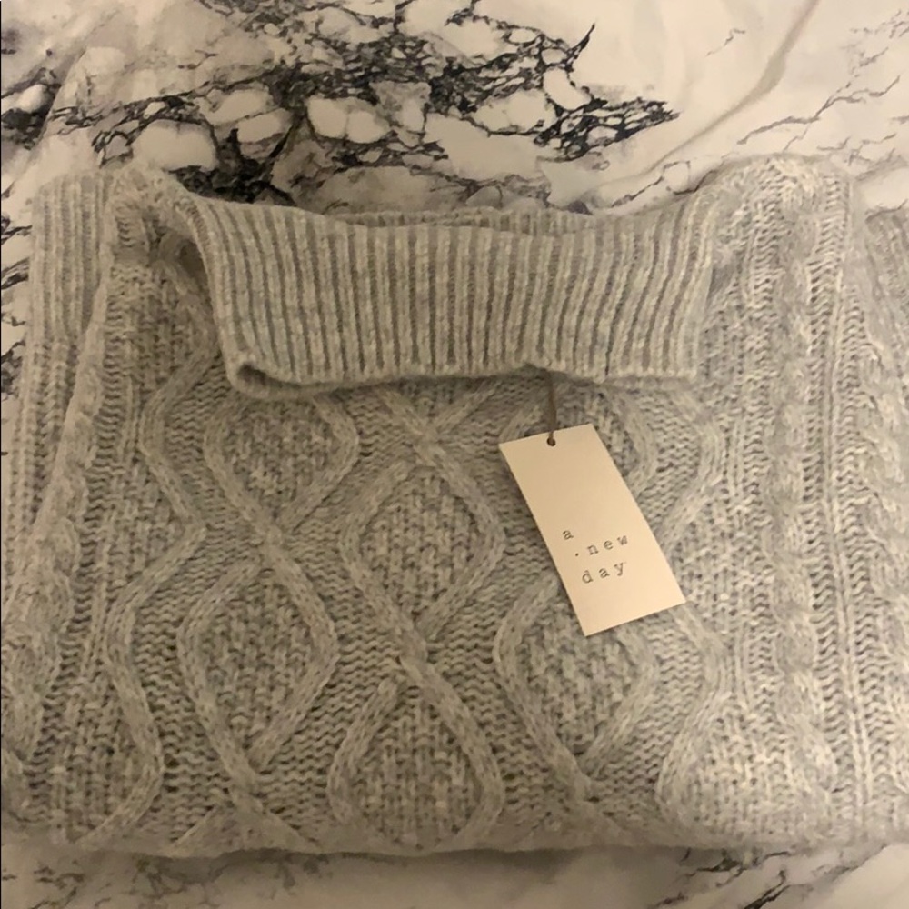 Oversized sweater. Never worn.